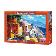 Castorland puzzle box featuring a scenic view of a coastal town with mountains in the background.