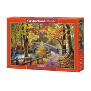 Castorland puzzle box with an autumn scene of a bridge over a stream.