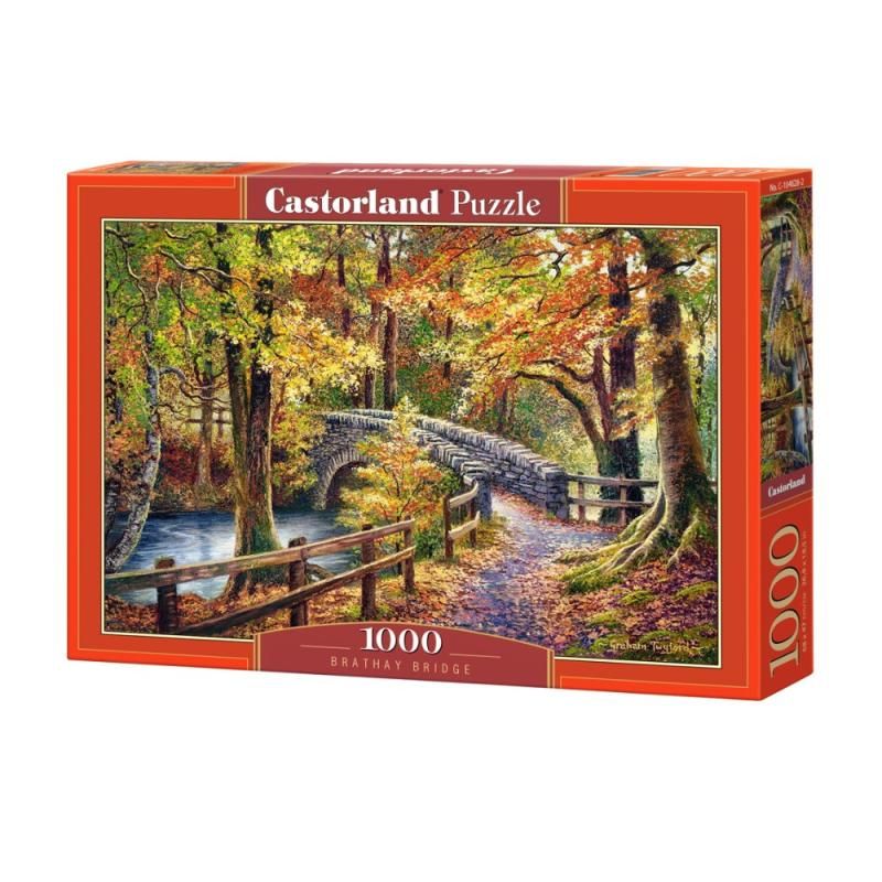 Castorland puzzle box with an autumn scene of a bridge over a stream.